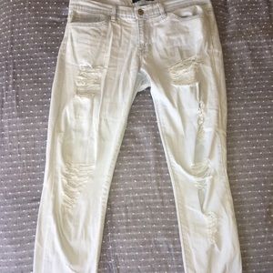 Denim jeans with holes.